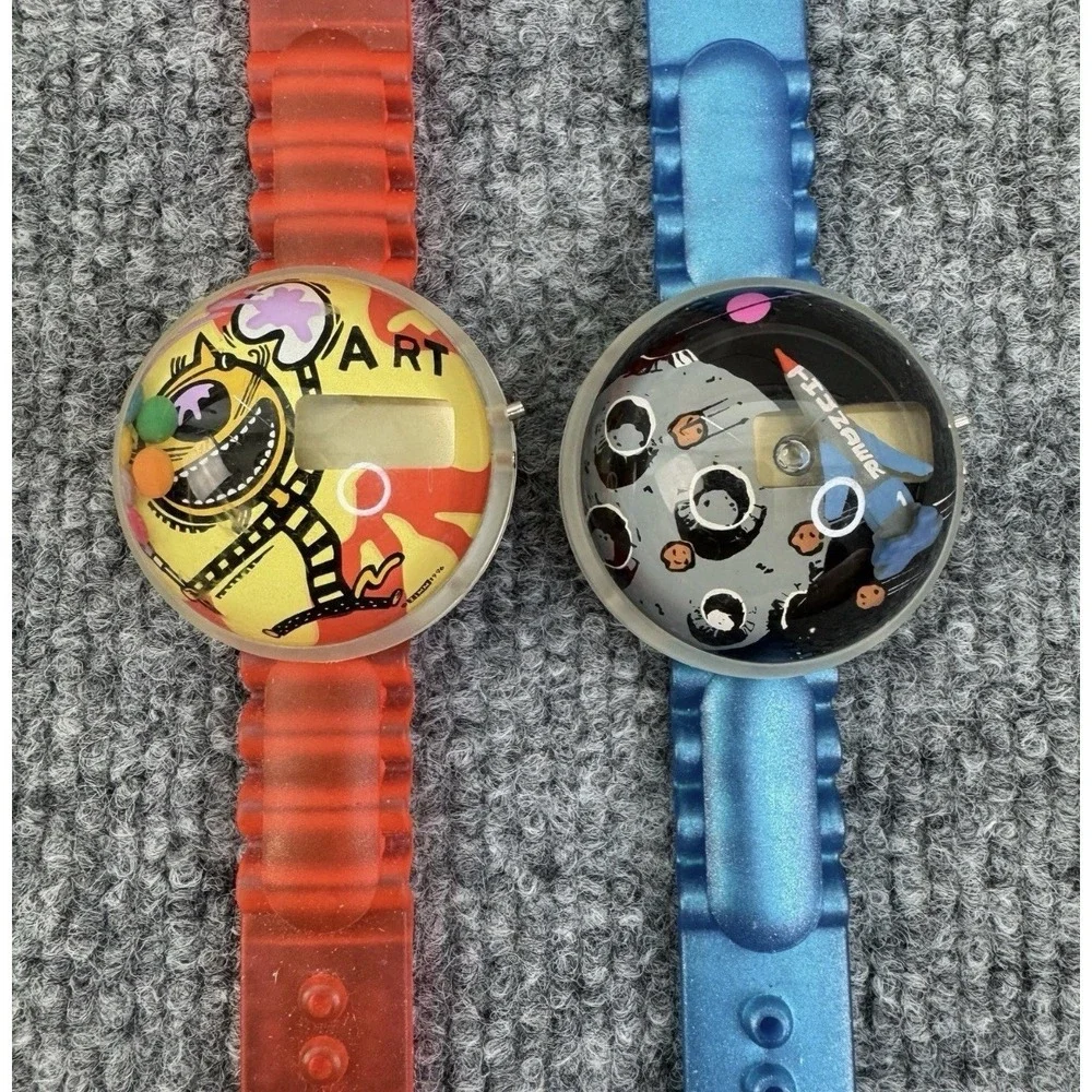 Lot Of 2‎ Bubble Watches UNTESTED Art Cat & Space Thunder